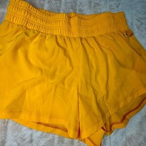DSG Women's Vibrant Yellowish Orange Stride High-Rise Athletic Shorts